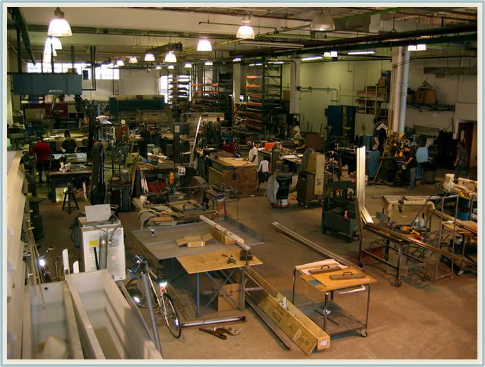 A large industrial workshop with machinery and tools.